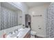 Bathroom featuring a single sink vanity, white countertops and accents, and a shower with curtain at 131 Kennington Dr, Goose Creek, SC 29445