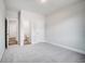 This bedroom offers neutral carpeting and paint, complemented by natural light at 134 Palfrey Dr, Ridgeville, SC 29472