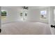 Spacious bedroom with three windows bringing in lots of natural light at 134 Palfrey Dr, Ridgeville, SC 29472