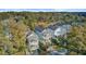 Lovely lowcountry neighborhood showcasing homes with double porches and mature trees at 1450 Eutaw Battalion Dr, Charleston, SC 29412