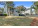 Expansive backyard featuring a well-manicured lawn and a cozy patio area for outdoor enjoyment at 1450 Eutaw Battalion Dr, Charleston, SC 29412