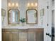 Bathroom featuring dual vanities, mirrors, and modern finishes at 1450 Eutaw Battalion Dr, Charleston, SC 29412