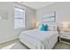 Bright bedroom features a comfortable bed, stylish decor, and great natural light at 1450 Eutaw Battalion Dr, Charleston, SC 29412