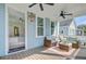 Outdoor deck with comfortable seating and view of neighborhood at 1450 Eutaw Battalion Dr, Charleston, SC 29412