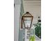 Close up of gas lantern outside of home on front porch at 1450 Eutaw Battalion Dr, Charleston, SC 29412