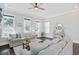 Bright and cozy living room featuring sofas, hardwood floors, and natural light at 1450 Eutaw Battalion Dr, Charleston, SC 29412