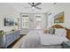 Main bedroom with ensuite access, ceiling fan, and luxury decor at 1450 Eutaw Battalion Dr, Charleston, SC 29412