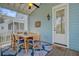 Relax on this screened in porch with a dining set and great views at 1450 Eutaw Battalion Dr, Charleston, SC 29412