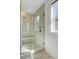 Walk-in shower with glass door and tiled walls at 1450 Eutaw Battalion Dr, Charleston, SC 29412