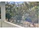 A beautiful view through the trees showcases the natural beauty surrounding this home at 1450 Eutaw Battalion Dr, Charleston, SC 29412