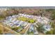 Aerial view of the neighborhood showcasing single-Gathering homes with a central green space at 1651 Valley Oak Rd, Johns Island, SC 29455