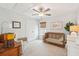 Comfortable Bedroom featuring a wooden crib, chair, and ample storage space at 1651 Valley Oak Rd, Johns Island, SC 29455