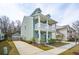 Stylish two-story home showcasing a spacious driveway and welcoming curb appeal at 1651 Valley Oak Rd, Johns Island, SC 29455