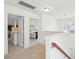 Bright hallway featuring neutral tones and an open layout leading to the bedrooms at 1651 Valley Oak Rd, Johns Island, SC 29455