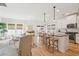 Open-concept living space featuring a kitchen with island and bar stools, and seating area at 1651 Valley Oak Rd, Johns Island, SC 29455
