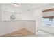 Cozy loft area with neutral carpet and natural lighting from windows at 1651 Valley Oak Rd, Johns Island, SC 29455