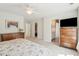 Well-lit main bedroom featuring a spacious layout, ceiling fan and ample closet space at 1651 Valley Oak Rd, Johns Island, SC 29455