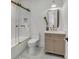 Modern bathroom with glass enclosed shower, stylish vanity and clean white color palette, creating a serene space at 178 Beresford Creek St, Daniel Island, SC 29492