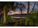 Private dock surrounded by lush foliage, providing a serene waterfront escape and beautiful views at 178 Beresford Creek St, Daniel Island, SC 29492