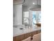Kitchen island features stainless steel faucet, white marble countertop, and wooden base at 178 Beresford Creek St, Daniel Island, SC 29492