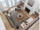 Aerial view of bright living room features a fireplace, neutral tones, and open design at 178 Beresford Creek St, Daniel Island, SC 29492