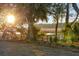 Scenic marsh front property with a dock, wooden walkway, and a glimpse of the sunset at 178 Beresford Creek St, Daniel Island, SC 29492