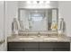 Elegant bathroom featuring double vanity, modern lighting, and a large mirror at 178 Garden Gate Way, Summerville, SC 29486