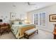 Bright bedroom showcasing a comfortable bed, natural light, and serene decor for a relaxing atmosphere at 178 Garden Gate Way, Summerville, SC 29486