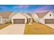 Charming single-Gathering home with a two-car garage and a well-maintained front yard under a beautiful sunset at 178 Garden Gate Way, Summerville, SC 29486