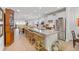 Open-concept kitchen features a large island, stainless steel appliances, and an open flow to the dining area at 178 Garden Gate Way, Summerville, SC 29486