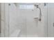 Modern bathroom shower featuring stylish marble tiling, a built-in bench, and sleek fixtures at 178 Garden Gate Way, Summerville, SC 29486