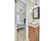 Bathroom features a vessel sink, wood-look floors and a view into the bedroom at 1861 Jaywood Cir, Charleston, SC 29407