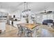 Bright, open floor plan with dining area, kitchen, and living room at 1861 Jaywood Cir, Charleston, SC 29407