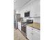 Updated kitchen featuring stainless steel appliances, granite countertops, and white cabinets at 1861 Jaywood Cir, Charleston, SC 29407