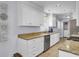 Open kitchen featuring granite counters, stainless steel appliances, and white cabinets at 1861 Jaywood Cir, Charleston, SC 29407