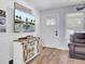 Comfortable living area with stylish console, neutral tones, and a front entrance view at 1861 Jaywood Cir, Charleston, SC 29407