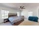Bright bedroom with neutral walls, a ceiling fan and natural light at 1925 Old Parsonage Rd, Charleston, SC 29414