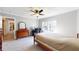 Bright bedroom featuring natural light, carpet floors, neutral walls, and a ceiling with texture at 1925 Old Parsonage Rd, Charleston, SC 29414