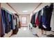 Spacious walk-in closet offers ample storage, shelving, and natural light at 1925 Old Parsonage Rd, Charleston, SC 29414