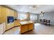 Kitchen featuring stainless steel appliances, center island and dining area at 1925 Old Parsonage Rd, Charleston, SC 29414