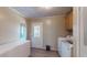 The laundry room includes a washer, dryer, and chest freezer at 1925 Old Parsonage Rd, Charleston, SC 29414
