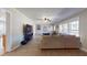 Inviting living room featuring neutral tones, large windows and tile flooring at 1925 Old Parsonage Rd, Charleston, SC 29414