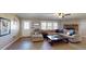 Comfortable living room featuring tile flooring, sectional couch and fireplace at 1925 Old Parsonage Rd, Charleston, SC 29414