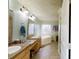Double sink vanity in the bathroom of this lovely home at 1925 Old Parsonage Rd, Charleston, SC 29414