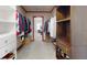 Spacious walk-in closet with built-in shelving and rods, offering ample storage space and organization at 1925 Old Parsonage Rd, Charleston, SC 29414