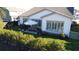 Aerial view of a home's backyard, showcasing the patio, lawn, garden and well kept landscaping at 2009 Utsey St, Johns Island, SC 29455