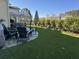 Inviting backyard featuring green artificial turf, comfortable seating, and a serene outdoor space at 2009 Utsey St, Johns Island, SC 29455