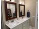 Bright bathroom with double vanity, decorative mirrors, and ample storage space at 2009 Utsey St, Johns Island, SC 29455