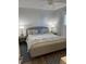 Cozy bedroom with stylish rug, comfy bed, and elegant side tables with lamps at 2009 Utsey St, Johns Island, SC 29455