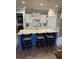Kitchen island with pendant lighting and seating that offers plenty of countertop space at 2009 Utsey St, Johns Island, SC 29455
